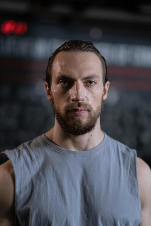 a man holding a tennis racquet on top of a tennis court, a portrait, by Adam Szentpétery, conor mcgregor, in a gym, acting headshot, square