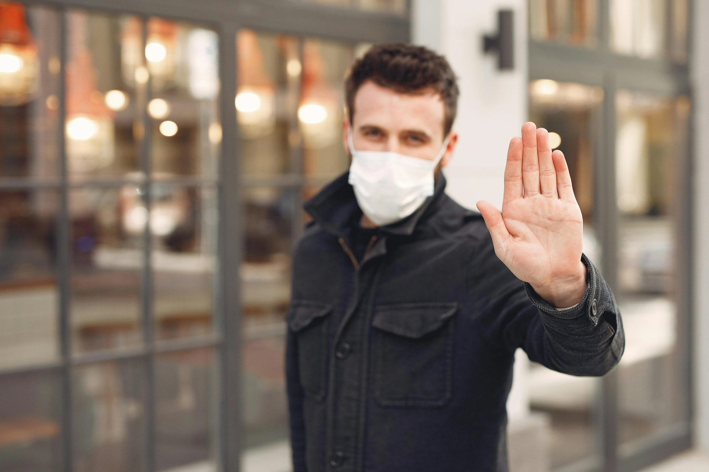 a man wearing a face mask making a stop gesture, pexels, square, ad image, bl, a tall