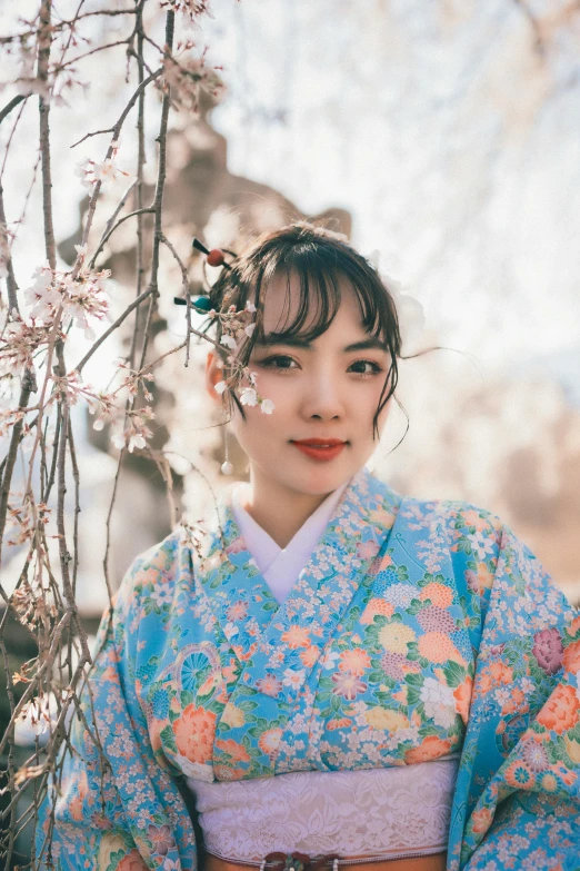 a woman in a blue and pink kimono, inspired by Itō Shinsui, trending on unsplash, a young woman as genghis khan, 🌸 🌼 💮, 5 0 0 px models, wide forehead