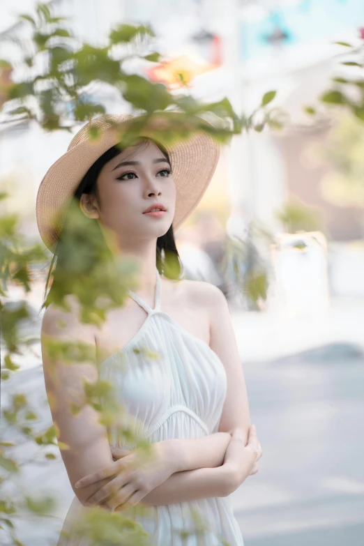 a woman in a white dress and a straw hat, inspired by Tan Ting-pho, pexels contest winner, handsome girl, with a tree in the background, #oc, asian human