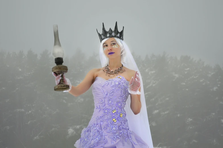 a woman in a purple dress holding a candle, inspired by Olaf Gulbransson, pexels contest winner, pop surrealism, wearing a light grey crown, only snow in the background, white royal dress, modeled