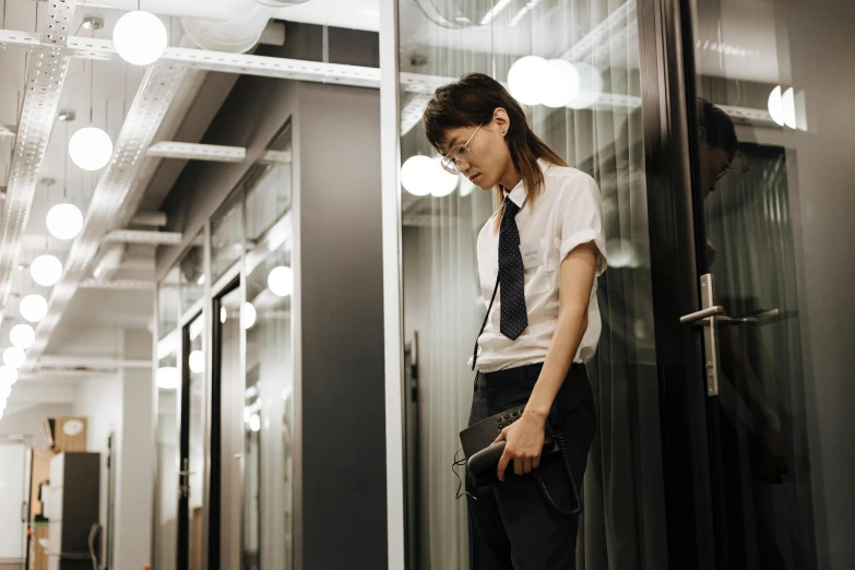 a man in a white shirt and tie leaning against a glass wall, unsplash, shin hanga, standing in a server room, girl wearing uniform, awkward, avatar image