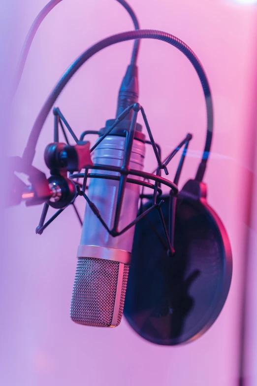 a close up of a microphone in a recording studio, an album cover, by Emanuel Witz, shutterstock, pop art, blue and violet color scheme, multiple stories, uploaded, radio equipment