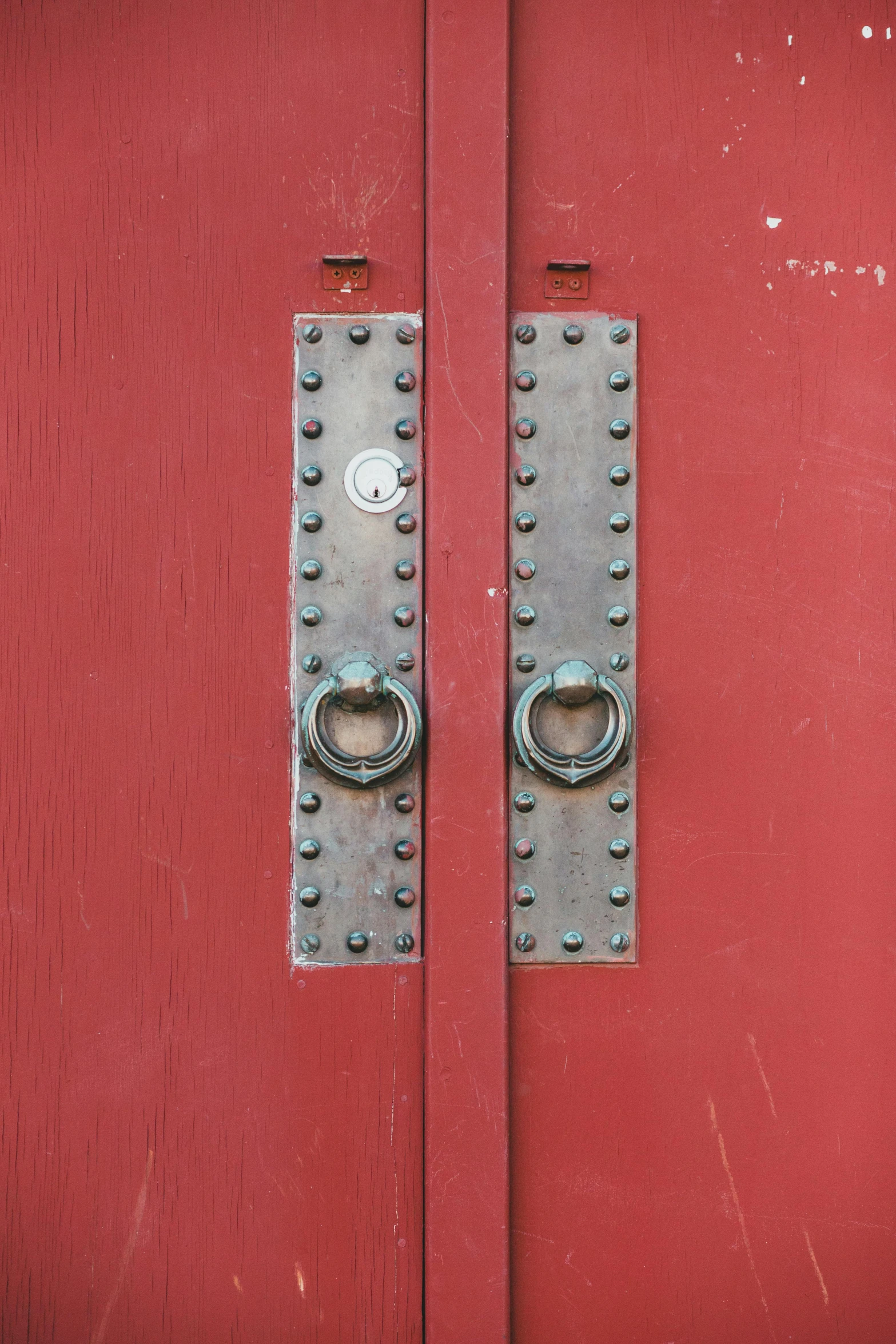 a pair of metal latches on a red door, an album cover, by Sven Erixson, unsplash, cloisonnism, rivets, square, chinese, red brown and grey color scheme