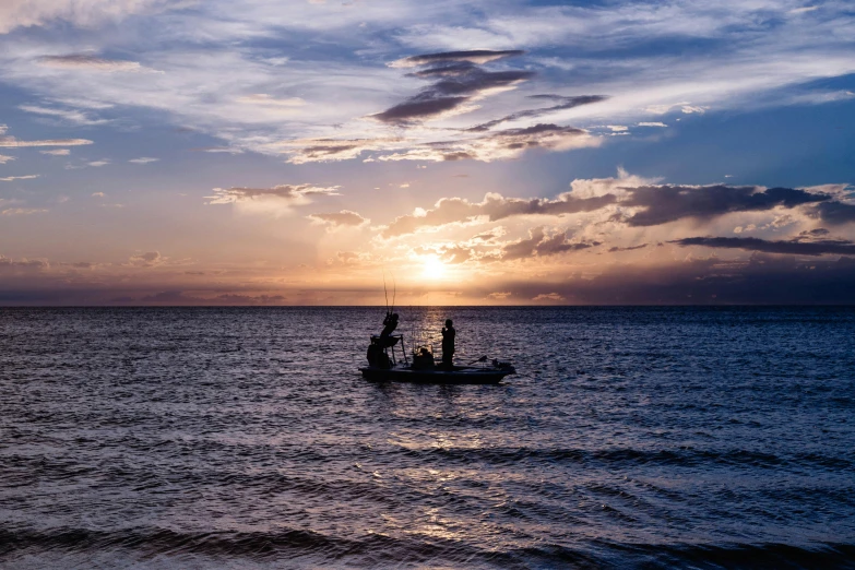 a couple of people on a small boat in the ocean, by Daniel Seghers, pexels contest winner, beautiful late afternoon, fishing, great barrier reef, late summer evening