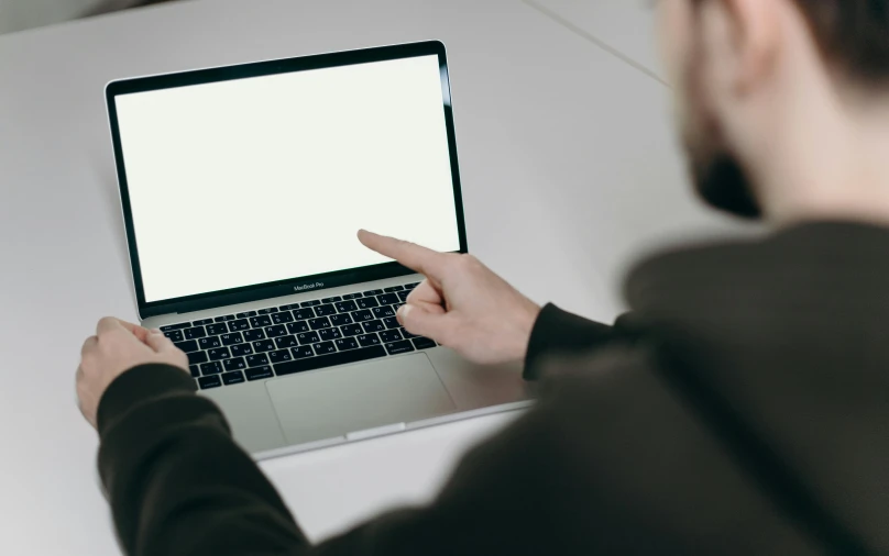 a man using a laptop computer with a blank screen, a computer rendering, by Carey Morris, pexels, someone lost job, pointing, official screenshot, rectangle