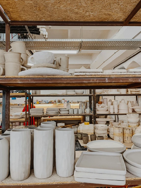 a room filled with lots of white plates and bowls, trending on unsplash, process art, stood in a factory, large jars on shelves, thumbnail, stan winston studios