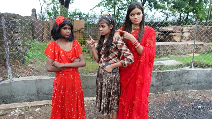 a group of women standing next to each other, flickr, samikshavad, threatening pose, drag, three women, teenager