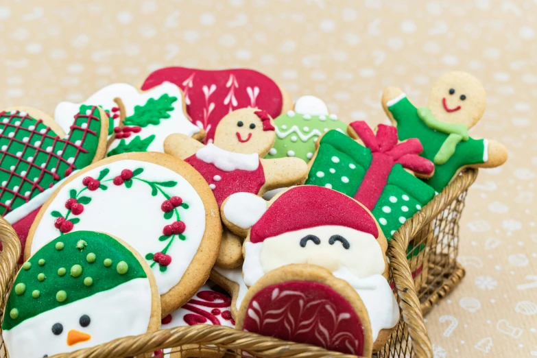 a basket filled with christmas cookies on top of a table, by Sylvia Wishart, pexels, naive art, full product shot, closeup of an adorable, felt, edible