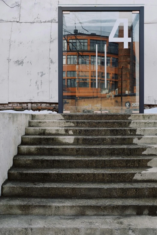 a red fire hydrant sitting in front of a building, inspired by Thomas Struth, brutalism, penrose stairs, in legnica, concrete steel glass, set photograph