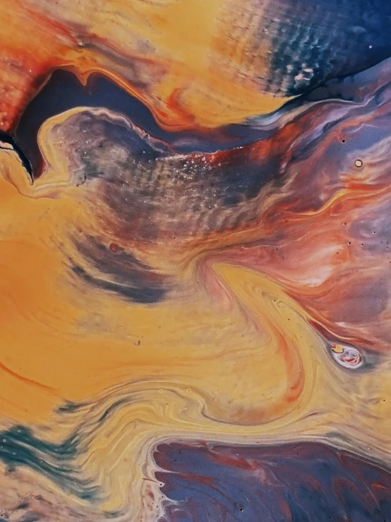 a close up of a painting on a table, inspired by Yanjun Cheng, trending on unsplash, metaphysical painting, sand swirling, orange planet, abstraction chemicals, 144x144 canvas