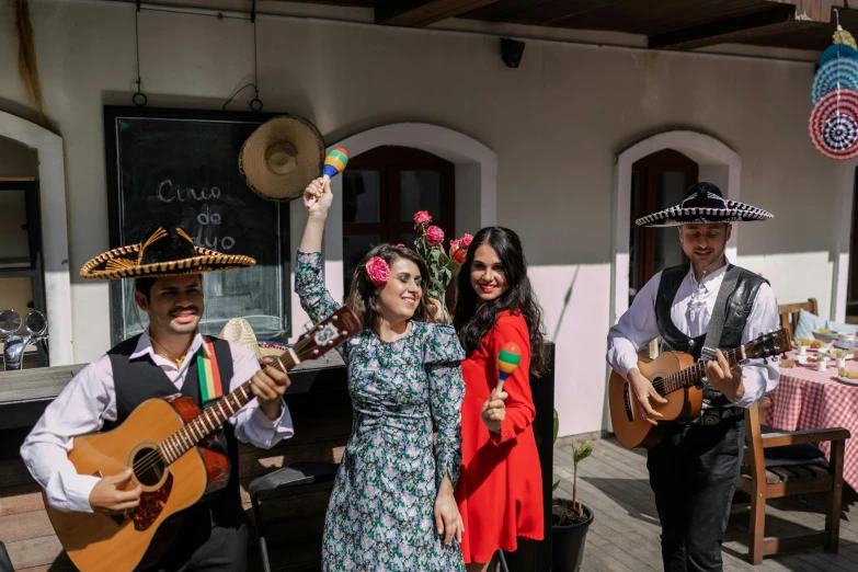 a group of people standing next to each other holding guitars, pexels contest winner, quito school, authentic costume, patio, 👰 🏇 ❌ 🍃, profile image