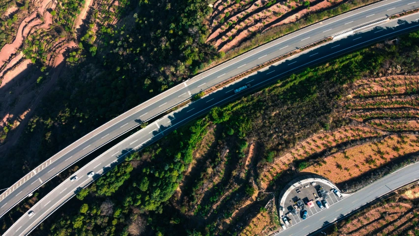 a couple of roads that are next to each other, a tilt shift photo, pexels contest winner, marbella landscape, overpass, thumbnail, full frame image