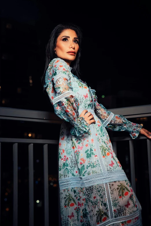 a woman standing on a balcony at night, an album cover, trending on pexels, hurufiyya, dressed in a flower dress, maggie cheung, light blue dress portrait, transparent background