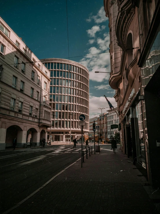 a city street filled with lots of tall buildings, a picture, pexels contest winner, viennese actionism, former gasometer in rome, in empty!!!! legnica, beige and dark atmosphere, office building