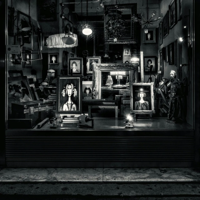 a black and white photo of a store front, pexels contest winner, surrealism, picture frames, kris kuksi, chiaroscuro oil painting, set at night