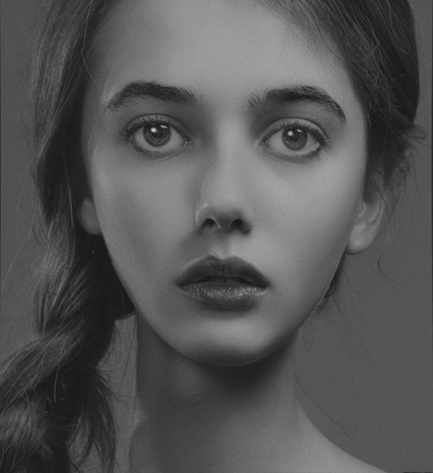 a black and white photo of a woman with long hair, a digital painting, inspired by irakli nadar, hyperrealism, slender symmetrical face, portrait of arya stark, greg ruth, natalia dyer