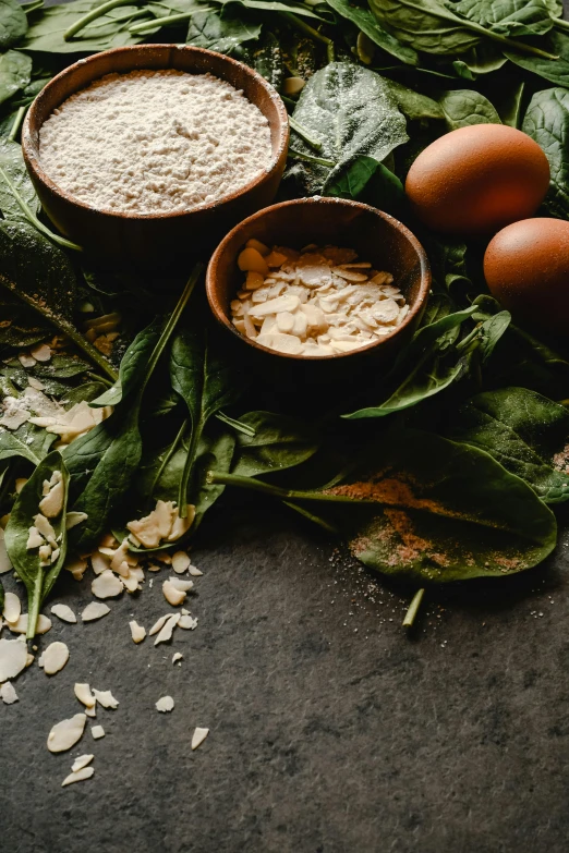 a bunch of food sitting on top of a table, by Lee Loughridge, trending on pexels, renaissance, dark green, eggs, magnesium, high quality product image”