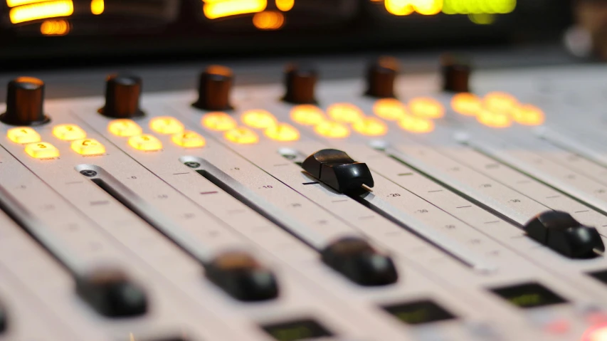 a close up of a sound board in a recording studio, an album cover, by David Donaldson, unsplash, private press, avatar image, studio orange, tannoy, image of random arts