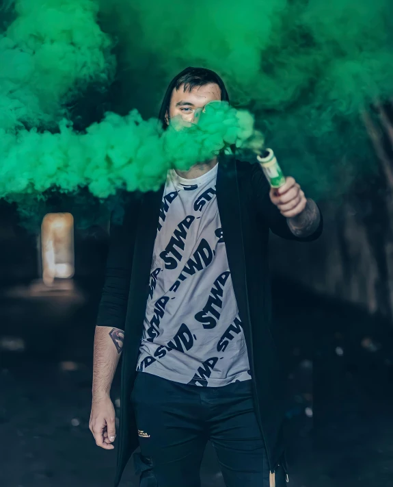 a man with green smoke coming out of his mouth, inspired by Seb McKinnon, graffiti, holding an activated lightsaber, gang clothing, :6 smoke grenades, split dye