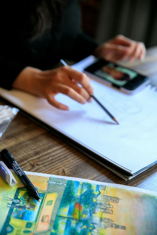 a woman sitting at a table writing on a piece of paper, a drawing, by Andre de Krayewski, pexels, visual art, schematic in a notebook, oil pastels, no - text no - logo, cartoonist