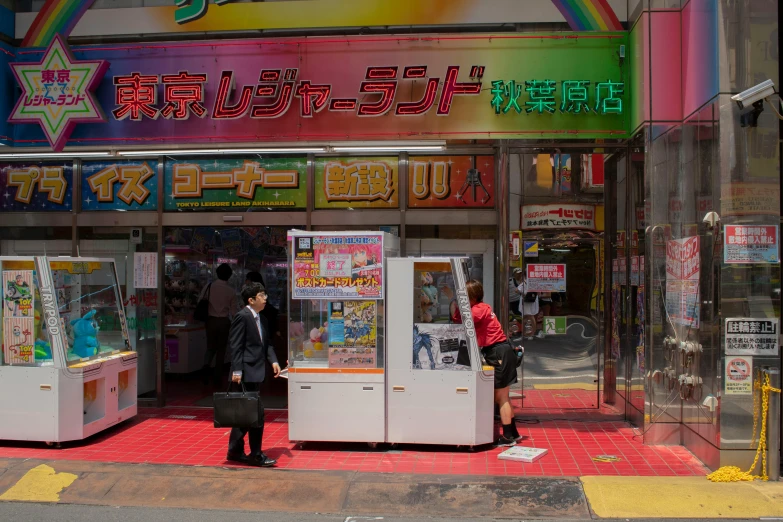 a couple of people standing in front of a store, a photocopy, unsplash, shin hanga, fruit machines, arasaka mech, exiting store, multicoloured