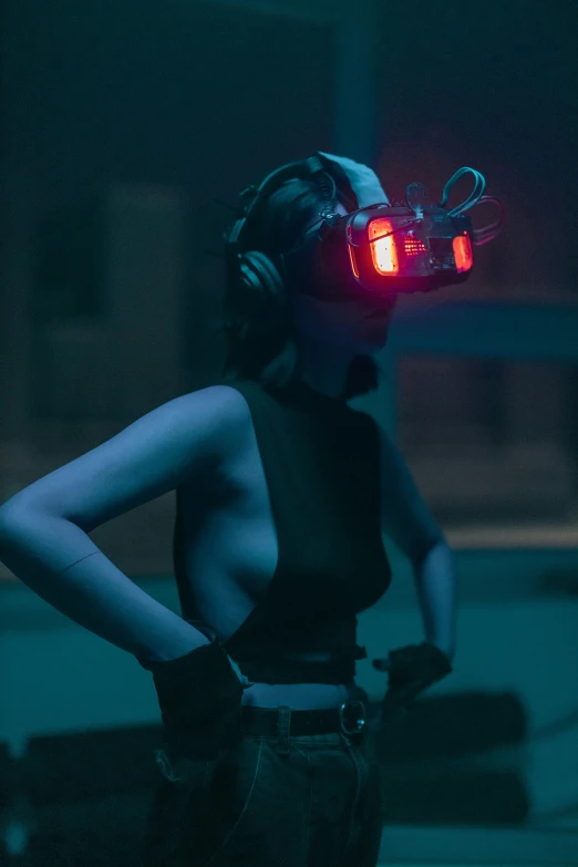 a woman wearing headphones in a dark room, cyberpunk art, inspired by Simon Stålenhag, vr goggles, futuristic fashion show, still from a music video, volumetric underwater lighting
