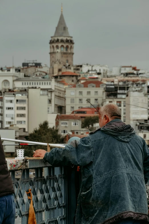 a couple of men standing on top of a bridge, istanbul, today\'s featured photograph 4k, gray men, slide show