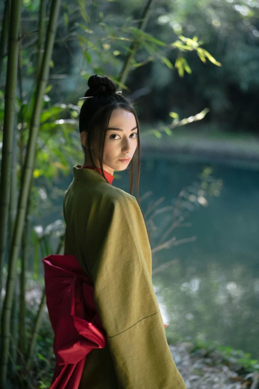 a woman in a kimono standing next to a body of water, dilraba dilmurat, avatar image