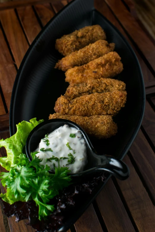 a close up of a plate of food on a table, rockets, white wings, 6 pack, thumbnail