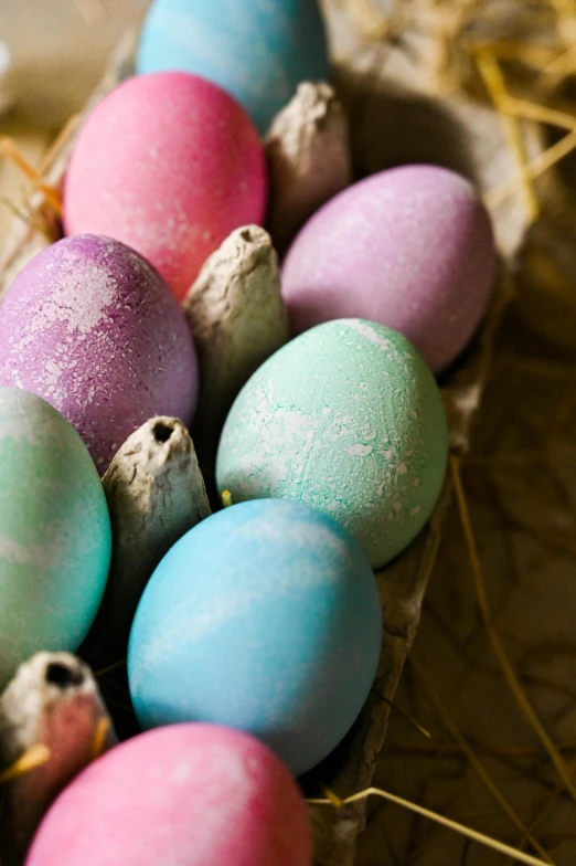 a bunch of eggs sitting on top of a pile of hay, tie-dye, chalked, pearlescent hues, thumbnail