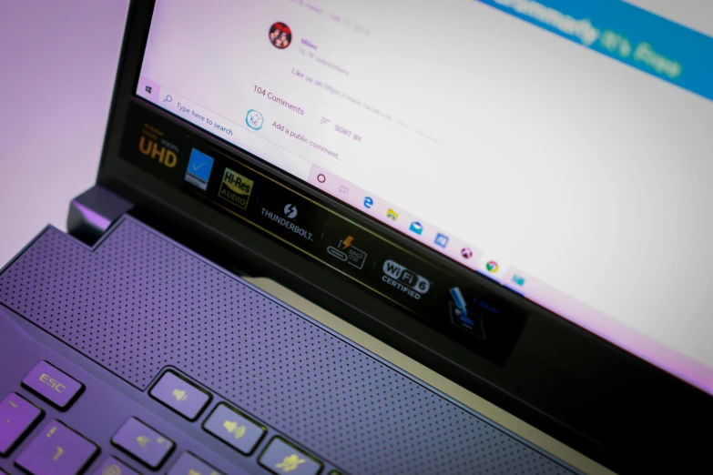 a laptop computer sitting on top of a desk, featured on reddit, colourful close up shot, ui intricate, slide show, lit from below