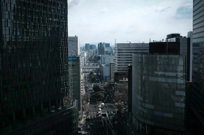 a view of a city from a high rise building, by Yasushi Sugiyama, unsplash contest winner, realism, prefecture streets, intersection, brutalist office buildings, today\'s featured photograph 4k