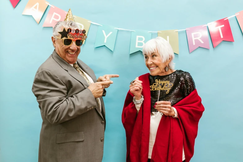 a man and a woman standing next to each other, a photo, by Helen Berman, unsplash, happy birthday, funny and silly, elderly, 15081959 21121991 01012000 4k