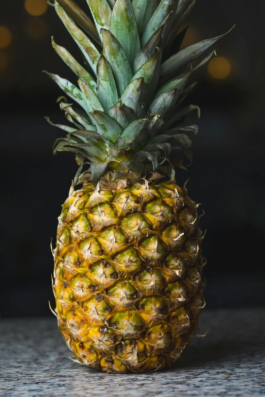 a close up of a pineapple on a table, uplit, mix, tall, frontal shot