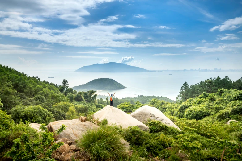 a group of people standing on top of a mountain, by Joseph Severn, unsplash contest winner, tropical landscape, many islands, shenzhen, lush greenery