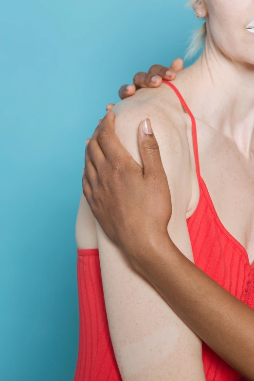 a woman with her arm around another woman's shoulder, medical image, bumps, square, meredith schomburg