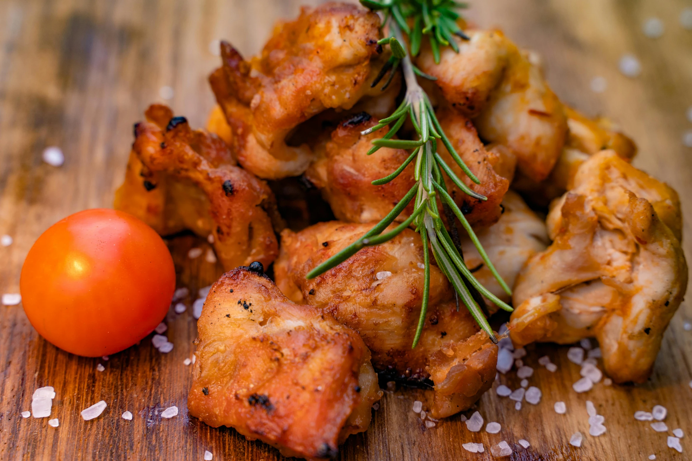 a bunch of food sitting on top of a wooden table, renaissance, chicken, profile image, background image, cooked to perfection