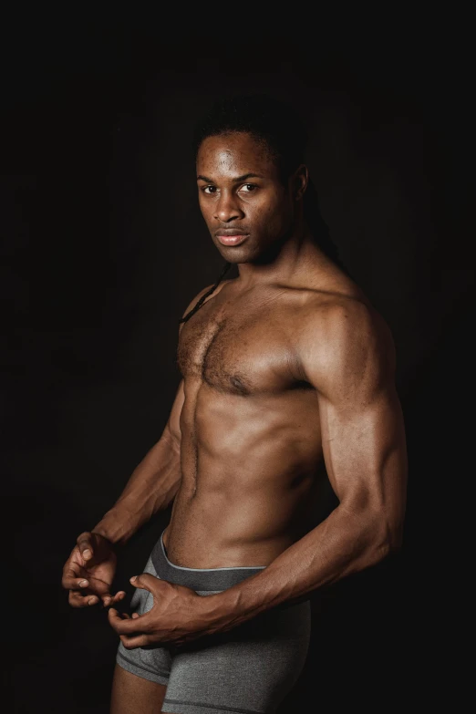 a shirtless man standing in front of a black background, inspired by Terrell James, with a black background, henri moore, full product shot, taken in the late 2010s