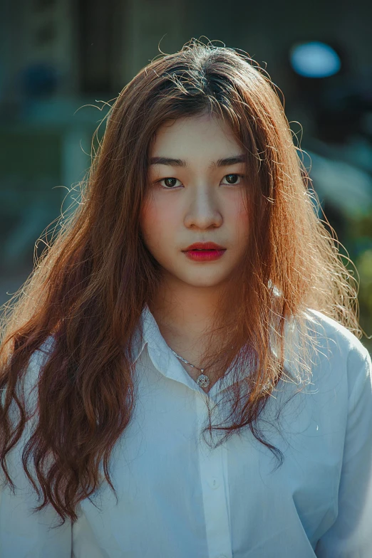 a woman with long red hair wearing a white shirt, by Ai Xuan, pexels contest winner, asian face, messy brown hair, 18 years old, cinematic. by leng jun