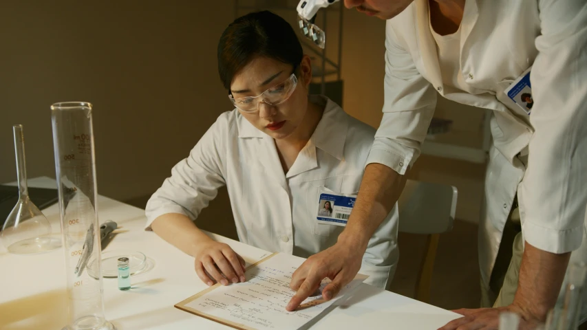 a man and a woman in lab coats looking at a piece of paper, inspired by Fei Danxu, hyperrealism, sangsoo jeong, anomalisa, ( ( theatrical ) ), plating