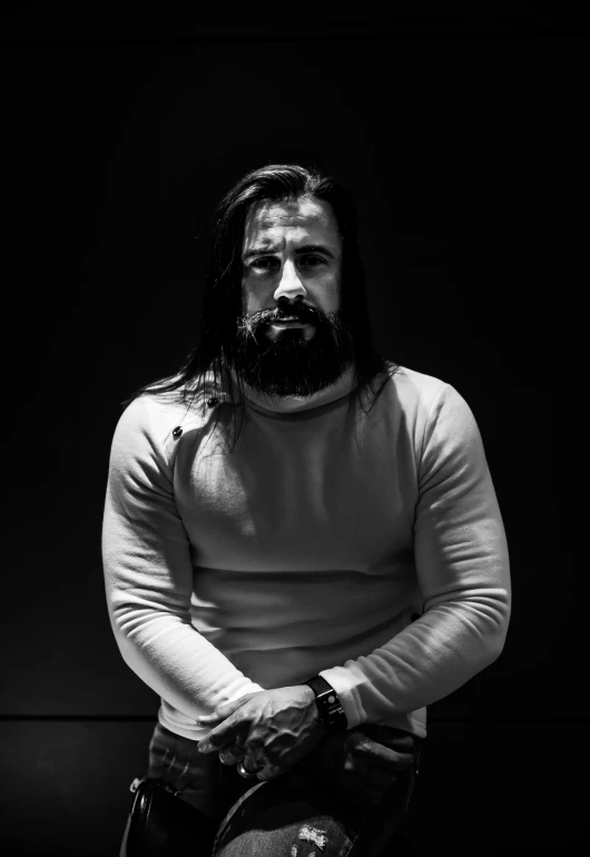 a black and white photo of a man with long hair, pexels contest winner, muscular character, commercial photo, cinematic outfit photo, instagram photo