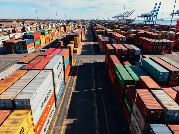 a lot of shipping containers sitting on top of a dock, pexels contest winner, low ultrawide shot, 1 6 x 1 6, high quality photo, sydney hanson