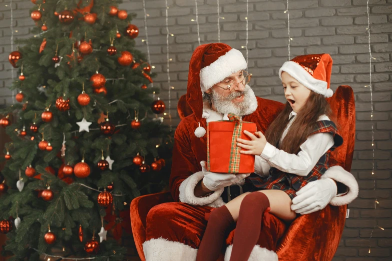 a little girl sitting in a chair next to a santa clause, pexels, 🎀 🧟 🍓 🧚, avatar image, ladies, tree's