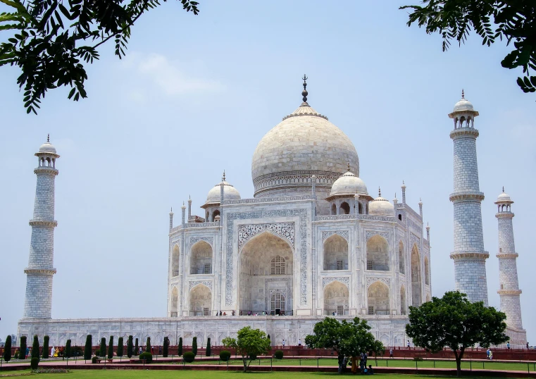 a large white building sitting on top of a lush green field, a marble sculpture, pexels contest winner, taj mahal, thumbnail, multicoloured, grey