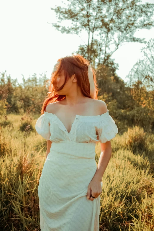 a woman in a white dress standing in a field, inspired by Elsa Bleda, pexels contest winner, renaissance, ( redhead, puff sleeves, better known as amouranth, bare shoulders