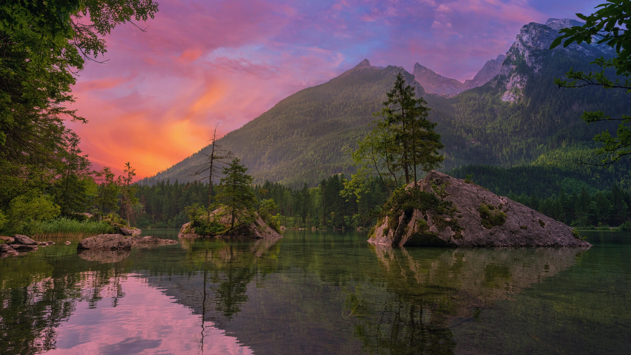 a body of water surrounded by trees and mountains, by Harry Haenigsen, pexels contest winner, romanticism, pink sunset, hdr photo, profile picture 1024px, beautiful composition 3 - d 4 k