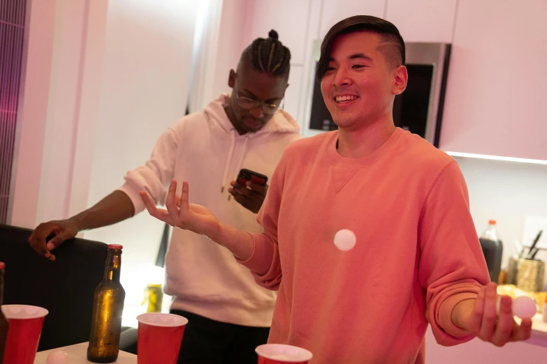 two men standing next to each other in a kitchen, inspired by Wang Duo, happening, many partygoers, yzy gap, cups and balls, profile image