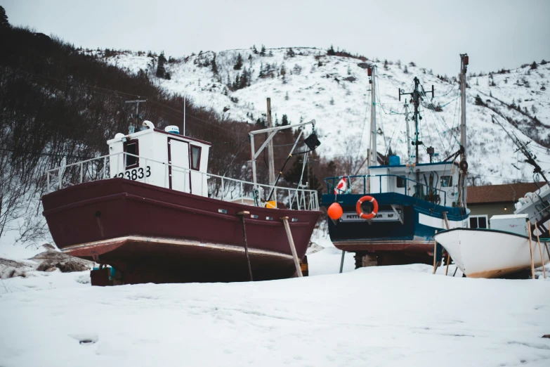 two boats that are sitting in the snow, pexels contest winner, mining outpost, 🦩🪐🐞👩🏻🦳, ready to model, nordic