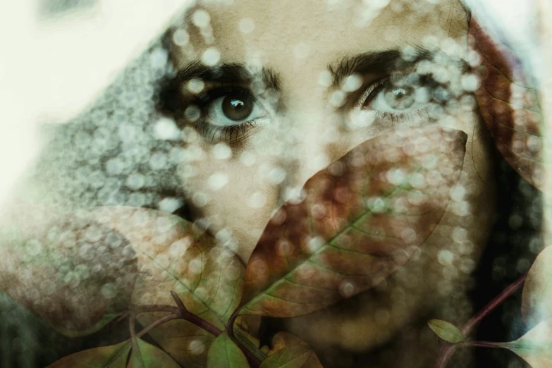 a close up of a person holding a leaf, by Lucia Peka, art photography, dreamy eyes, digital art'', wintertime, mysterious woman